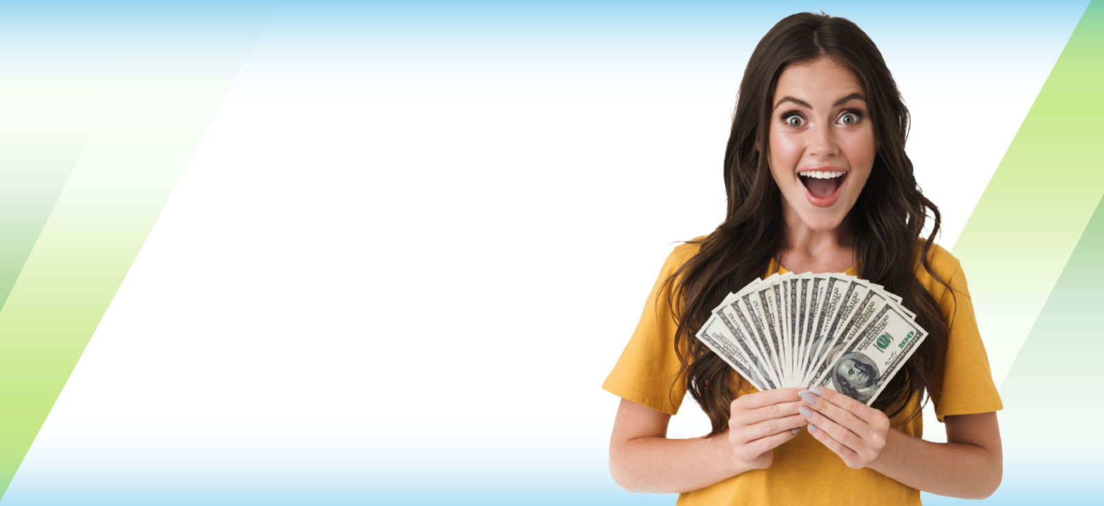 Excited woman holding dollar bills fanned out