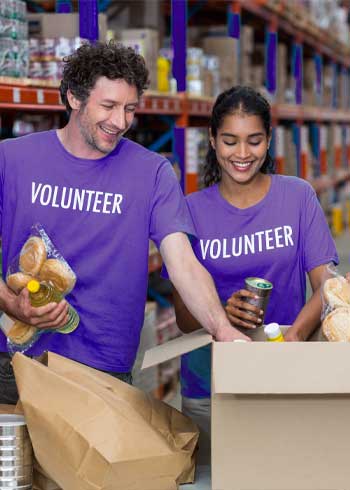 Volunteers packing food