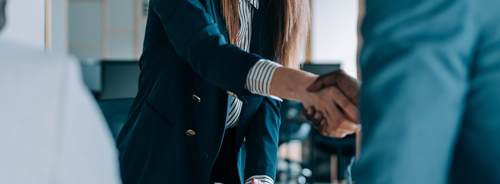 Close up of business people shaking hands