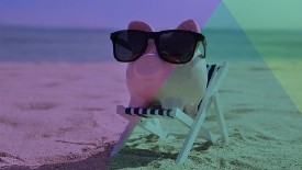 Pig in chair at the beach